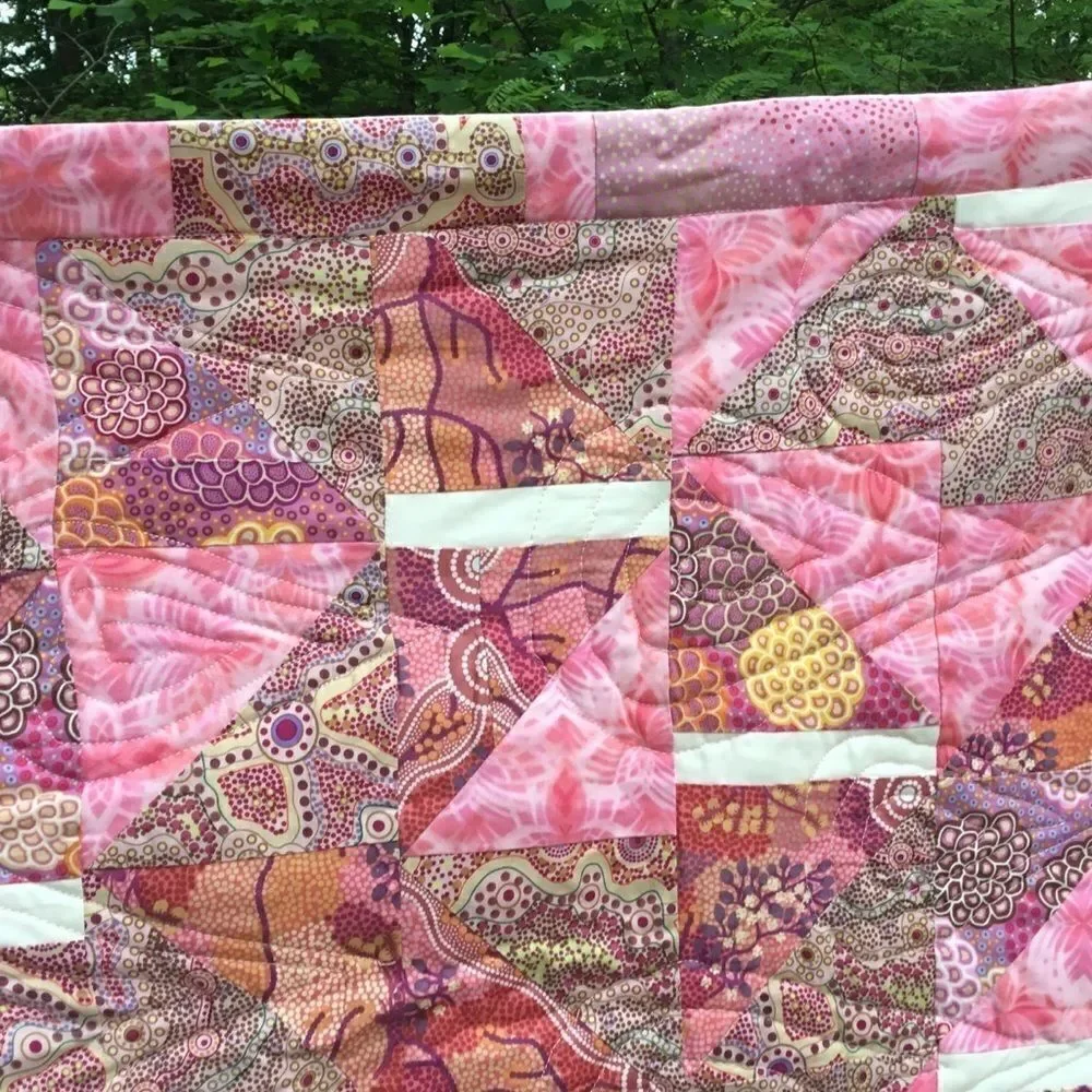 NWT. Hand Crafted Pinks Aboriginal Prints Quilt